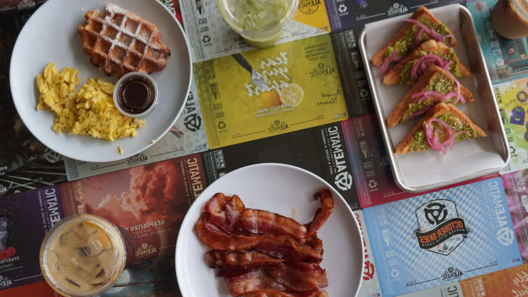 Breakfast, coffee, bacon, and toast on an Alematic tabletop